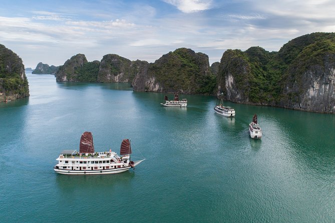 1-Day Bai Tu Long Bay Cruise: Pristine, Fun & Away fr the Crowds - Crew and guide: small group energy makes a difference (Smiley and Huang)
