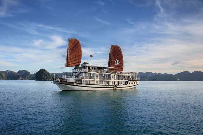 2-Day In Halong Bay Cruise With Transfer From Hanoi - Day 2: Tai chi, bamboo boat cave time, and the Dark & Light Cave finale
