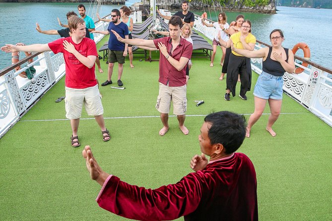 2-Day Oriental Sails Junk Cruise of Halong Bay - Day 2: tai chi at dawn, Luon Cave by kayak or sampan, and the “last views” photo run