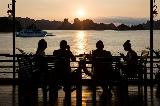2D1N: Halong Bay 4-Star Cruise - Cave, Kayak, Swim, Meals - Sunset party, deck games, and squid fishing options