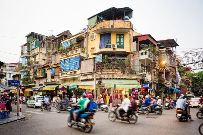 5-Day Northern Vietnam Tour: Hanoi - Ninh Binh - Halong Bay - Day 2: Halong Bay caves, Ti Top viewpoint, and sunset on deck