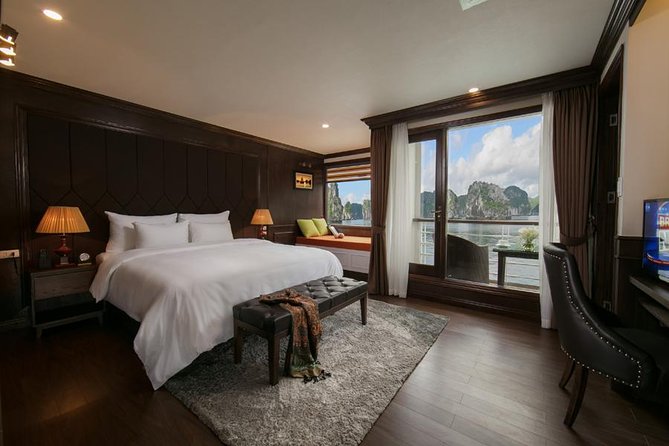 5 stars cruise, 4 stars price - private balcony cabins - 2 days - 1 night tour - Day 1: Hanoi pickup, lunch on the way, then Lan Ha swimming and kayaking
