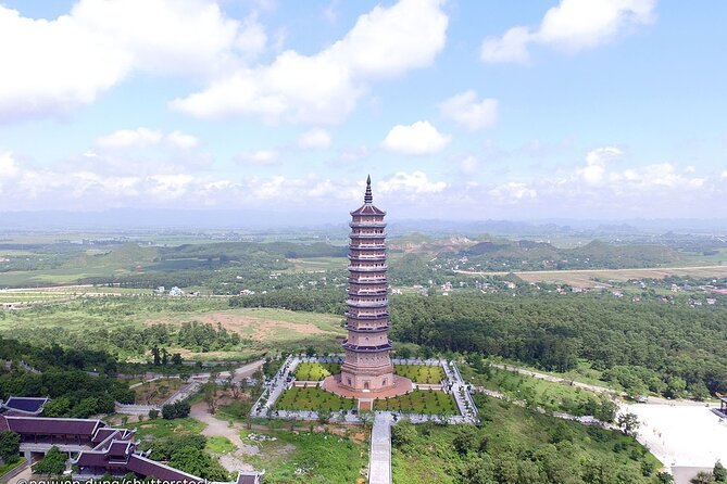Bai Dinh Trang An Day Trip with Buffet Lunch,Boat Trip and Electric Car 2 Ways - Entering Bai Dinh Pagoda: Bronze Buddha, 500 La Han, and Electric Car Comfort