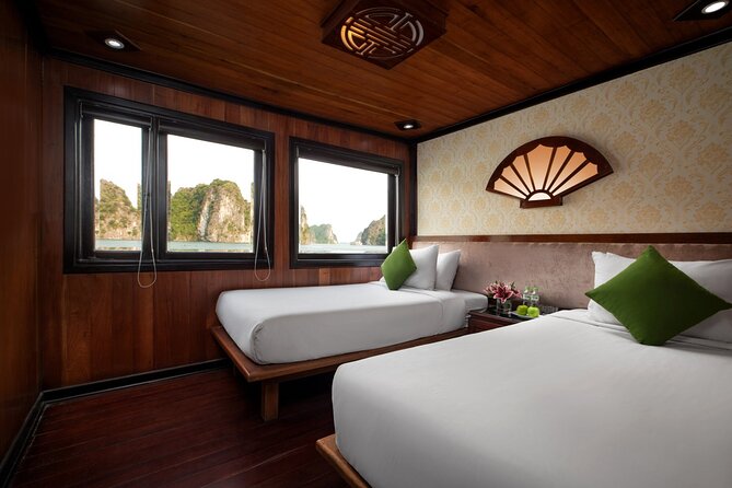 Bai Tu Long bay Deluxe cruise 2D1N: fishing villages, meals, cave, kayaking - Breakfast, tai chi, and a fisherman-rowed boat to Vung Vieng
