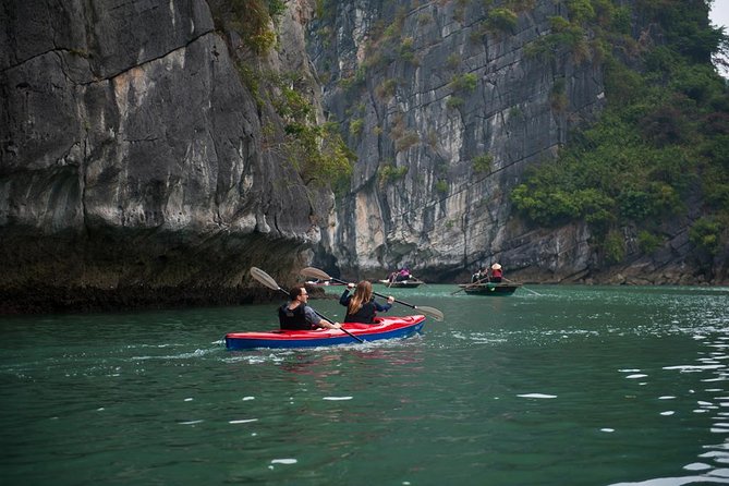 Bai Tu Long bay Deluxe cruise 2D1N: fishing villages, meals, cave, kayaking - Thien Canh Son Cave and packing for sun, water, and quick changes