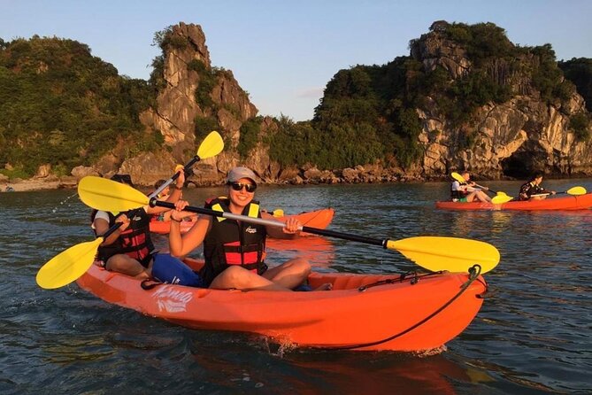 Bai Tu Long & Ha Long Bay 3-Day 2-Night Cruise from Hanoi - Night onboard: tai chi vibes, squid fishing, karaoke, and real group energy