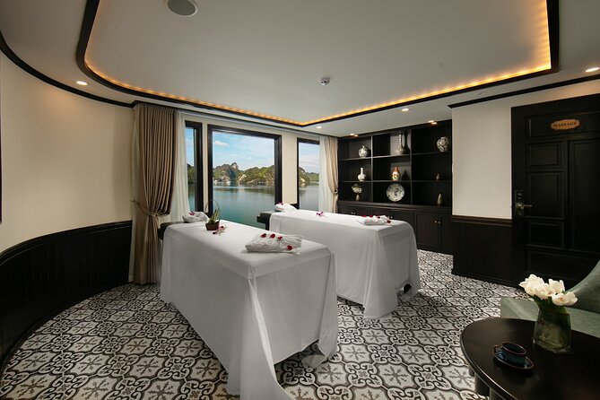 Best Luxury Hermes Cruise to Halong Bay 2 Days 1 Night from HANOI - Day 2: sunrise deck, Tai Chi, breakfast, and cave time