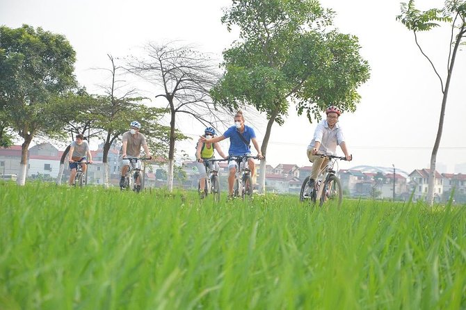 Bicycle Tours Hanoi: Full Day Bicycle Tours City & Countryside - Hữu Tập Lake and the downed B-52: a reflective stop on the route