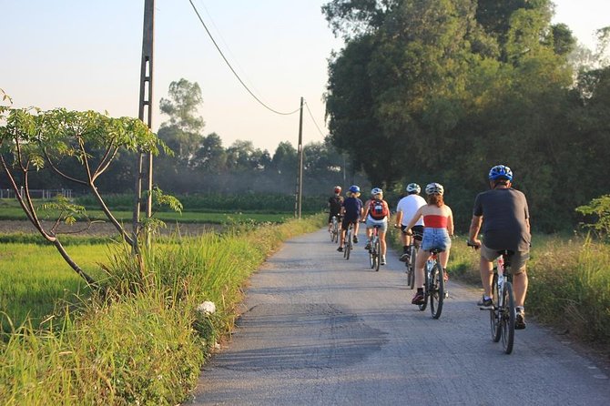 Bicycle Tours Hanoi: Full Day Bicycle Tours City & Countryside - Passing Hanoi icons by bike: a city tour that doesn’t sit still