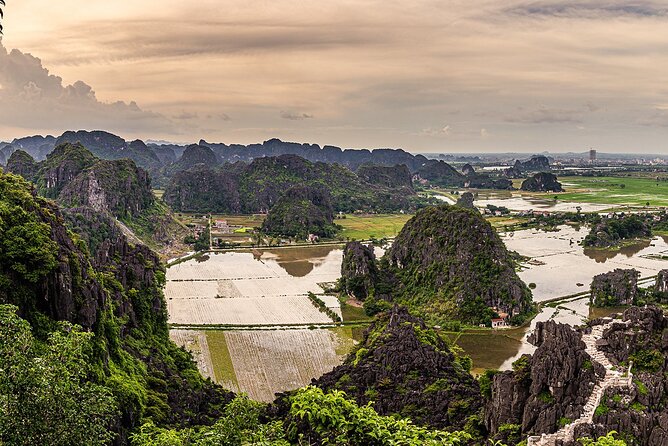 Boat and Bike Riding with Mua Cave in Ninh Binh Full Day Tour - Hoa Lu Temples: Dinh & Le Power in the 10th Century