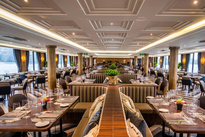 Boss Cruise 2-day Explore Halong Bay from Hanoi - Day 2 finish: check-out timing, disembark at 10:15–10:30, and return to Hanoi