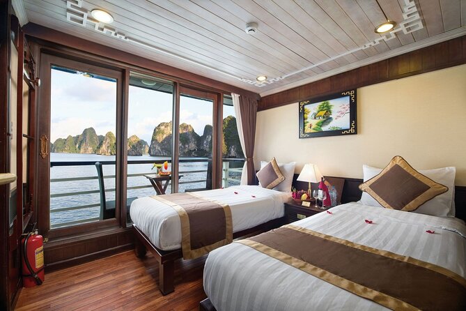 BOUTIQUE CRUISES Halong Bay 2 Days,1 Night Tour: Swimming,Caving, and Kayaking - Day 2: Breakfast on Board, Photo Stops, and Tuan Chau Return