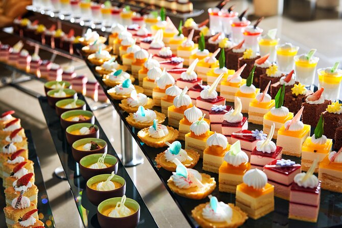 Buffet on Paradise Delight Dining Cruise Halong Bay Tour - The grotto stop: stalactites, stalagmites, and colored lighting