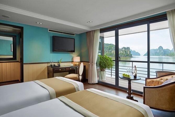 Capella Cruise 3-day Explore Halong Bay and Lan Ha Bay from Hanoi - Day 3: Dark & Bright Cave by Bamboo Boat, Brunch, and Back to Hanoi