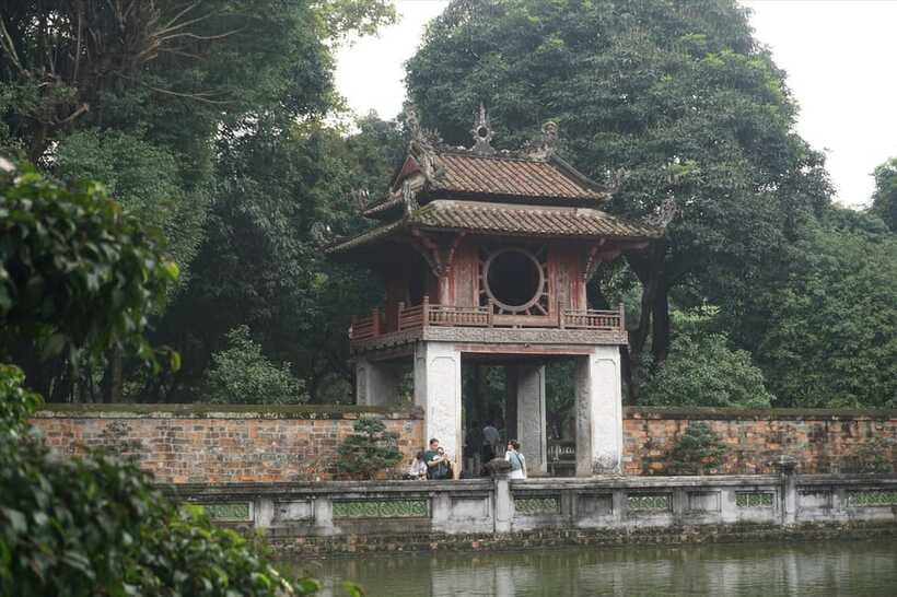 Cycling Through Hanoi: Old Quarter Pagodas & Red River Delta - B52 Lake and the Pass-By Rail and Political Landmarks