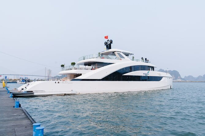 Day Trip - Luxury Experience in Ha Long Bay by Saquila Yacht - Ha Long City views from the water: islands, architecture, and market energy