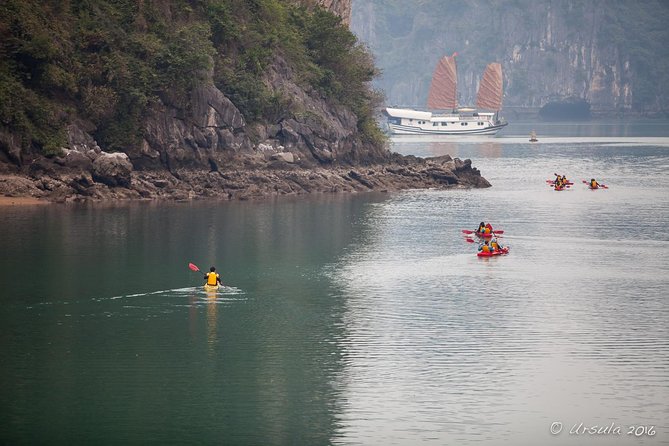 Deluxe Halong Bay 6 Hours Cruise To Visit Surprising Cave And Titop Island - Sunset Party on Deck: Wine, Fruit, Candy, and a Better Photo Hour