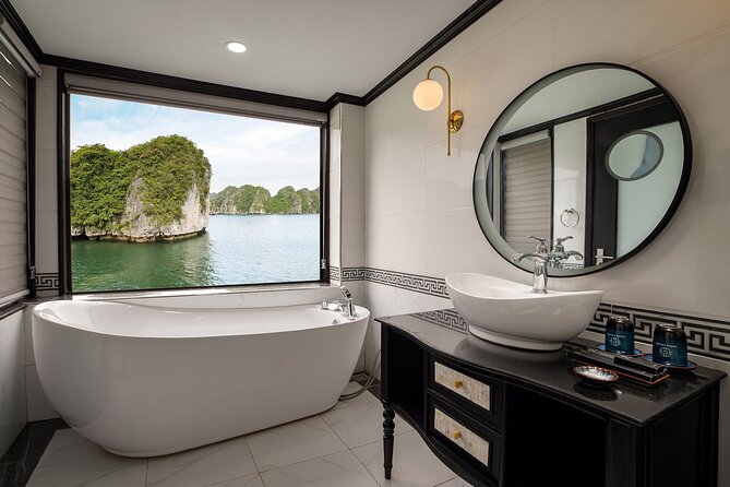 Dora Cruise – Best 2D1N Luxury Cruise in Halong & Lan Ha Bay - Day 2: Tai Chi at 6:30, then Dark & Bright Caves (Hang Sang & Toi)