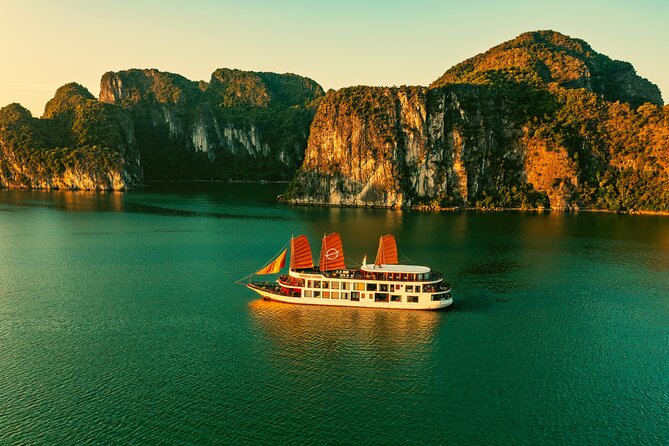 Emperor Cruises Experience 2 Days 1 Night in Halong Bay. - Kayak, bamboo boating, caves, and squid fishing