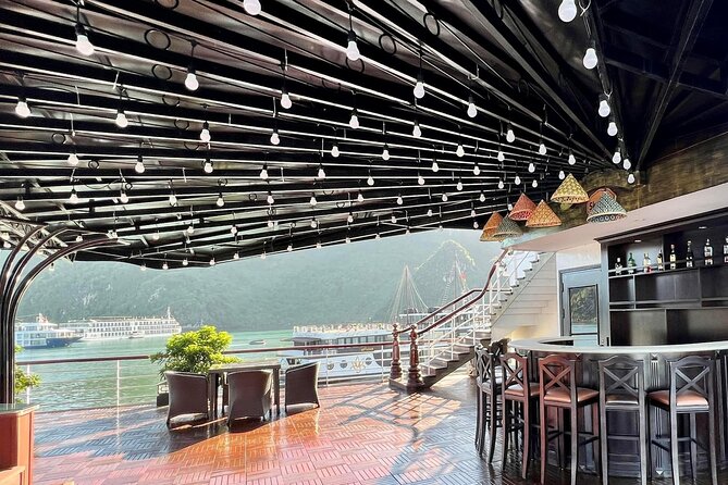 Erina Cruise Lan Ha Bay 2 days 1 night with roundtrip transfer - Day 2: Tai Chi at dawn and Dark & Bright Cave by tender