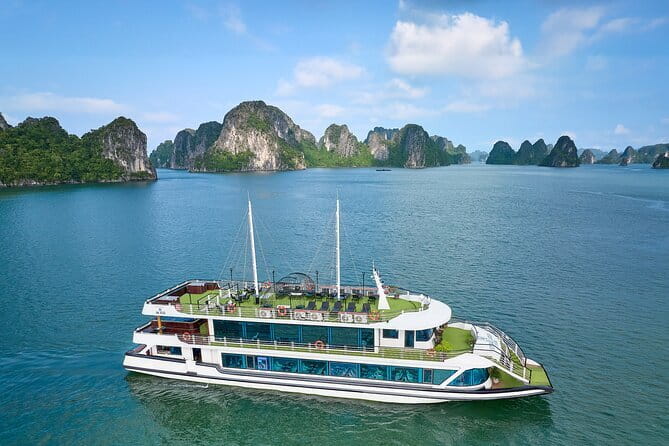 Excite Cruise Full Day Explore Halong Bay from Hanoi - Bai Tu Long Bay cruising: limestone scenery with breathing room