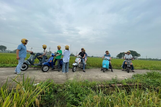 Exploring Vespa Tour Through Little Red River Delta - City icons first, then the quiet of the Little Red River Delta