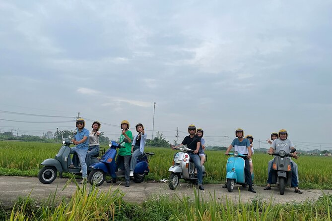 Exploring Vespa Tour Through Little Red River Delta - Stop 3: Long Biên Bridge—photo time over a historic crossing