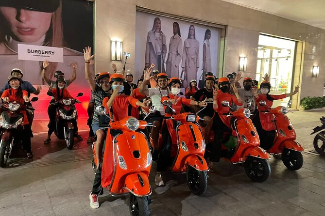 Female Riders Vespa Night Street Food + Train Street food 4 Hours - Stop 3: Long Bien at night with ceramic road and Chuong Duong Bridge (45 minutes)