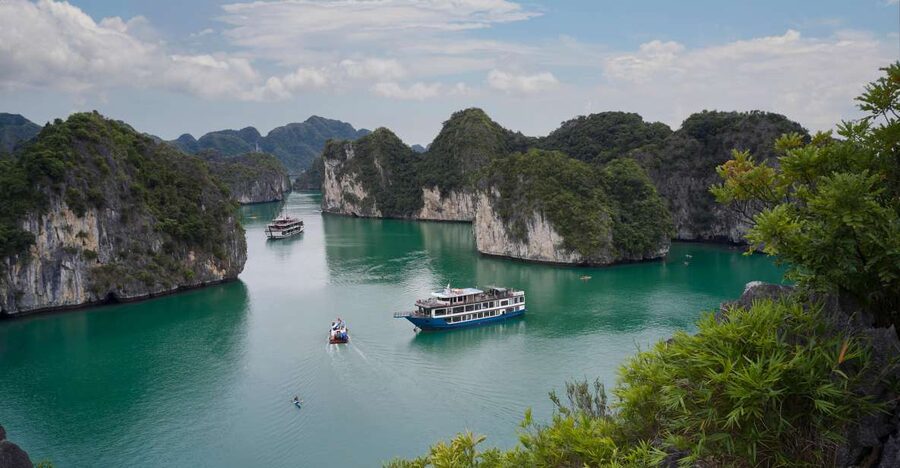 From Halong: 2 Days / 1 night with Halong - Lan Ha tour - Dark & Bright Cave Morning: The Row-Boat Approach Is Part of the Story