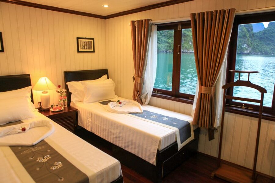 From Hanoi: 2-Day & 1 Night Halong Bay Tour - Luon Cave: bamboo boat or kayaking in emerald water