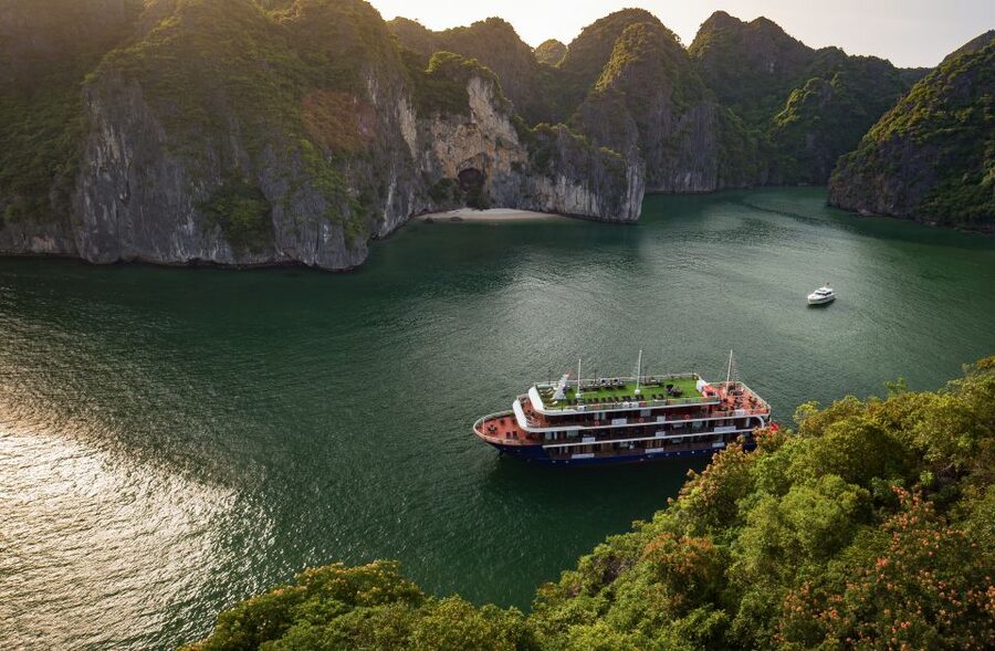 From Hanoi: 2-Day Halong and Lan Ha Bay La Pandora Cruise - Day 2 at sunrise: Dark & Bright Cave by local rowing boat