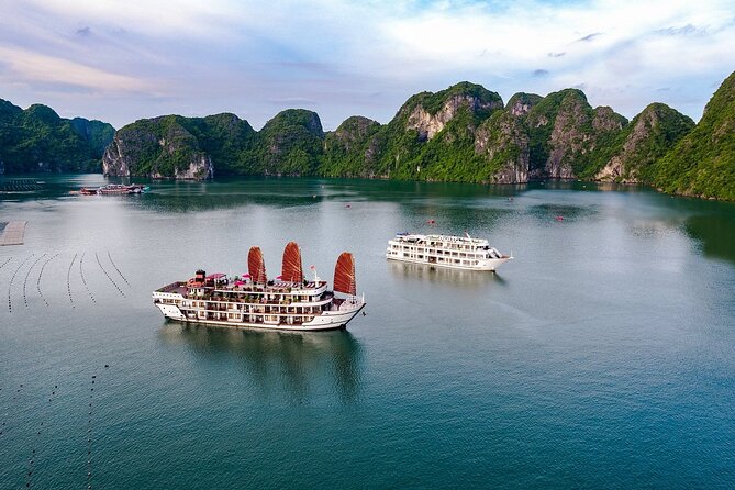 From Hanoi: 2-Day Luxury Halong Cruise Explore Caves & Island - Tuan Chau Marina and the welcome aboard flow