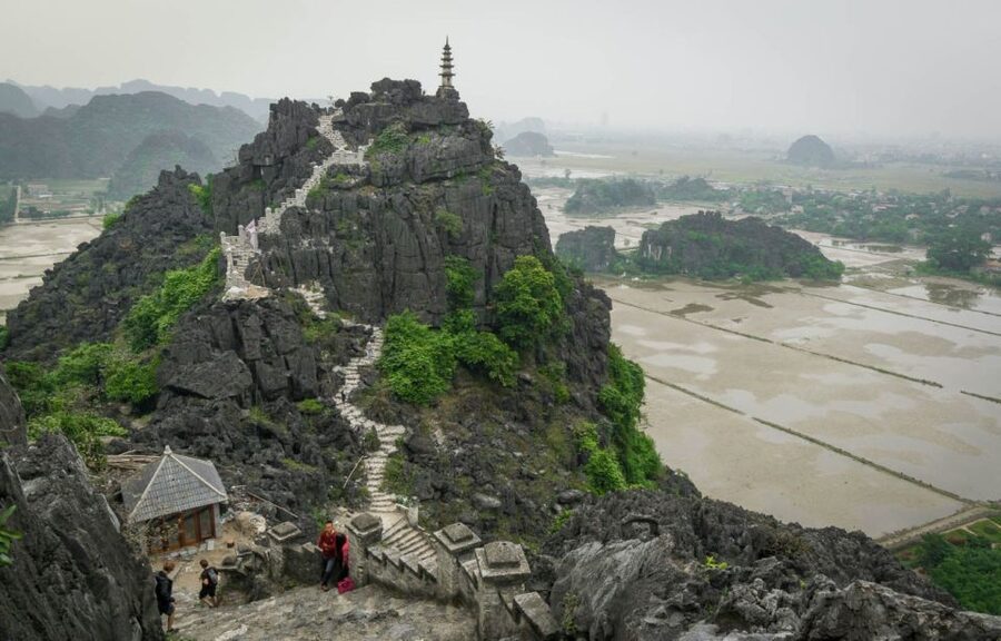 From Hanoi: 2-Day Ninh Binh Tour with Ha Long Bay Cruise - Titop Island: beach time, optional peak trek, and a change of pace