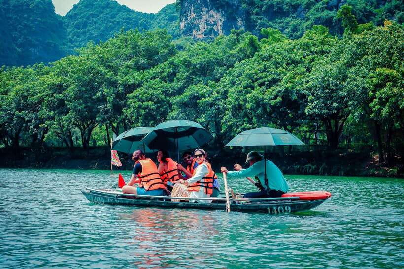 From Hanoi: Bai Dinh, Trang An Mua Cave - A Scenic Day Tour - Trang An boat caves and karst cliffs: UNESCO scenery at slow speed