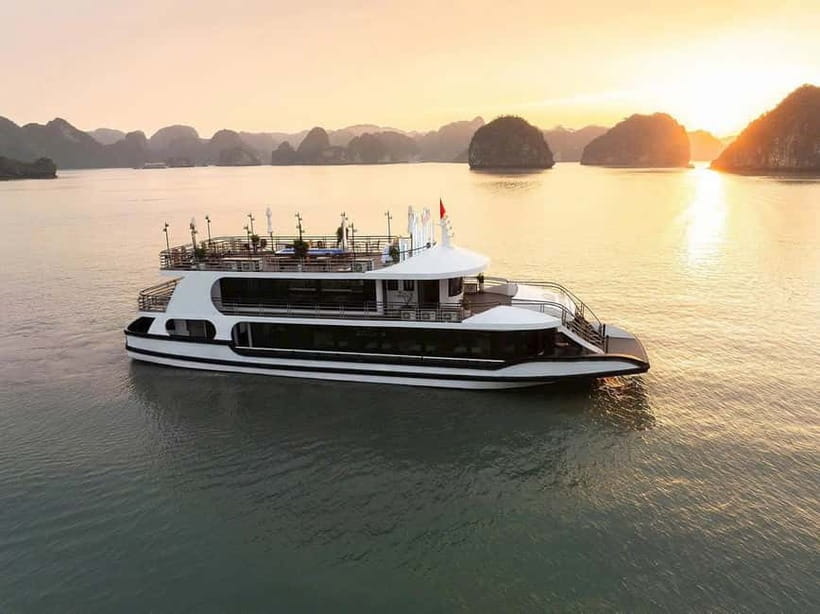 From Hanoi:Ha Long Bay Day Tour w/ Thien Cung Cave& Kayaking - Thien Cung Cave: limestone drama with colored lighting