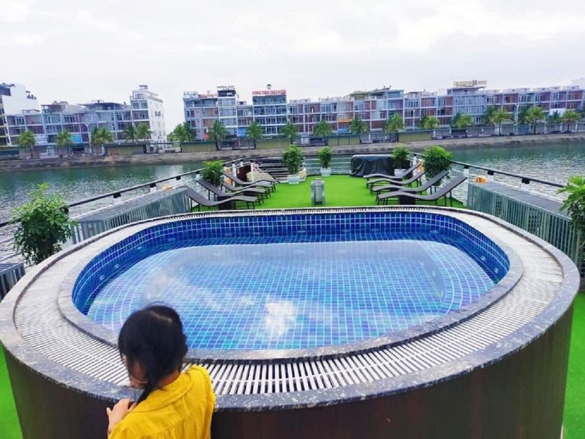From Hanoi: Ha Long Bay Luxury Cruise Day Tour with Jacuzzi - Sailing Ha Long Bay: Passing the Iconic Rocks and Settling In