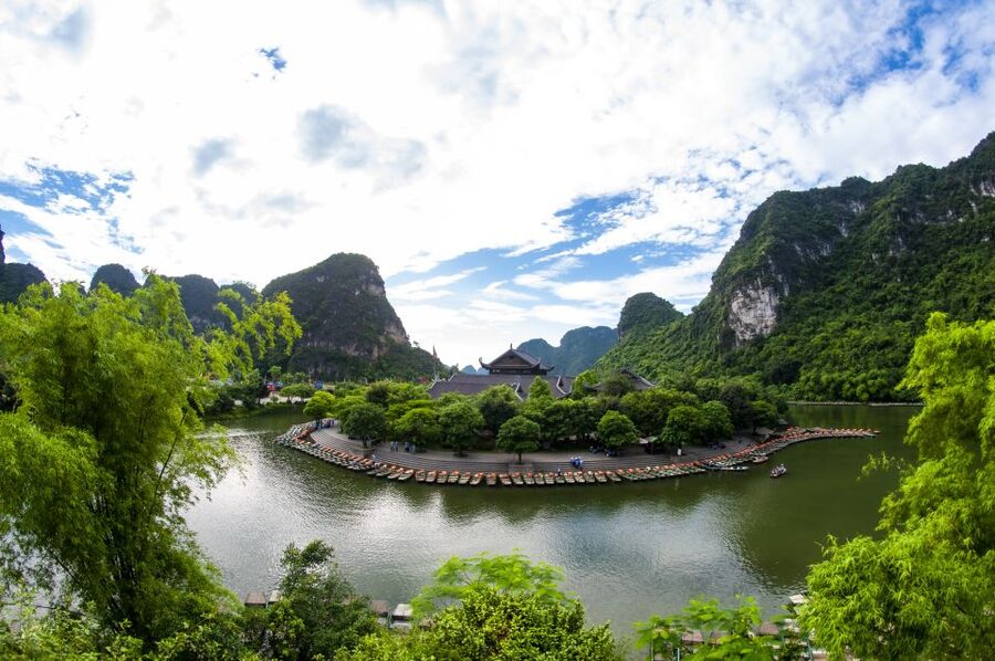 From Hanoi: Mua Cave - Tam Coc Full Day Tour - Tam Coc sampan boat: drifting through Hang Ca, Hang Hai, and Hang Ba