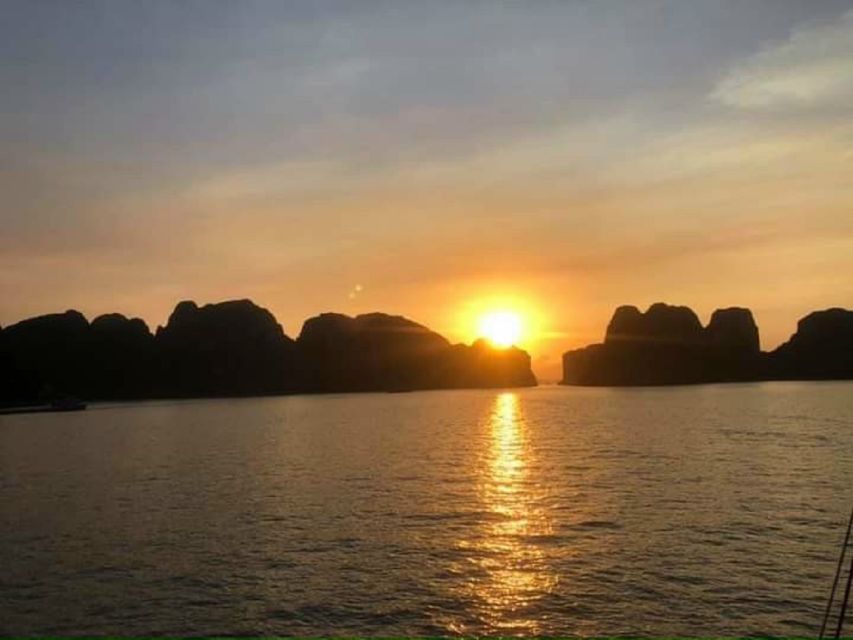 From Hanoi: Ninh Binh Ha Long Bay 5-Star 3-Day Cruise - Day 3: Tai Chi sunrise, Sung Sot Cave, then back to Hanoi