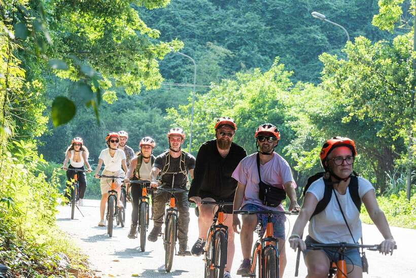 From Hanoi: Trang An, Hoa Lu & Mua Cave Full-Day Luxury Tour - Trang An by Sampan: Light, Dark, and Cooking Wine Caves