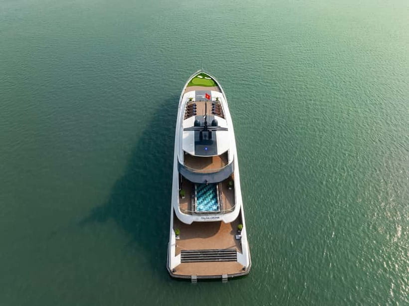 Full Day: Fabulous Halong Bay Tour with Taliya Cruise 5<em> – 6 Key Points That Make This Halong Bay Day Tour Worth It’ /></p>
<ul>
<li><strong>UNESCO Halong Bay plus the quieter Lan Ha Bay</strong> mix: you get the famous scenery, but you also spend time where the water feels calmer and less crowded.</li>
<li><strong>Dark and Bright Cave</strong> with a bamboo boat ride: you’re not just looking at karst from afar.</li>
<li><strong>Ao Ech kayaking and swimming</strong>: you get actual water time, not only photos from the deck.</li>
<li><strong>Vietnamese spring roll cooking demo</strong> with afternoon tea: a tasty way to learn local food basics.</li>
<li><strong>Sunset party on the sundeck</strong>: the trip times itself so the bay can go golden.</li>
<li><strong>5-star style crew service</strong>: multiple guides and staff members are called out for being friendly and making adjustments when needed.</li>
</ul>
<h2 id="getting-to-tuan-chau-marina-without-losing-your-day">Getting To Tuan Chau Marina Without Losing Your Day</h2>
<p><img width="820" height="615" decoding="async" src=