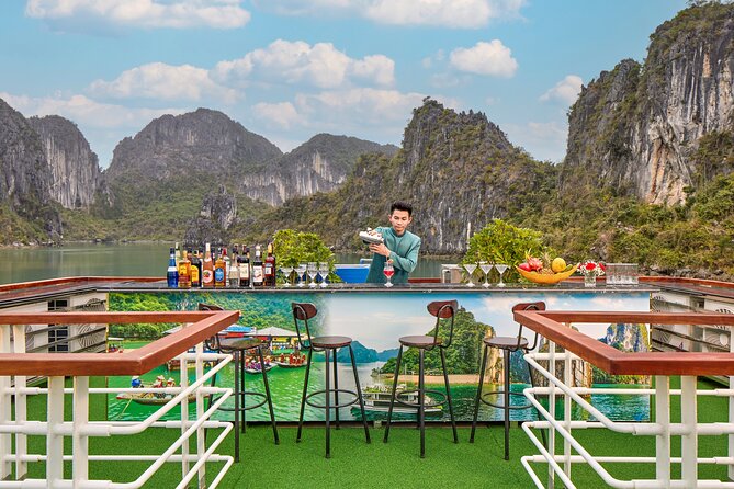 Full Day Halong Bay Luxury Limousine Bus & Buffet Lunch - Hang Luon Cave: choose kayaking or a bamboo boat in calm water