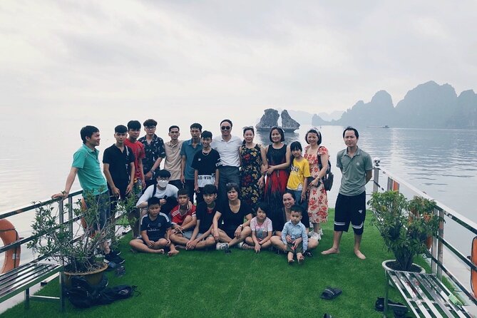 Ha Long Bay 1 Day 6 hour-Cruise with kayaking, Cave visiting & Swimming - Titop Island: Swim, Sun, and a Viewpoint Trek