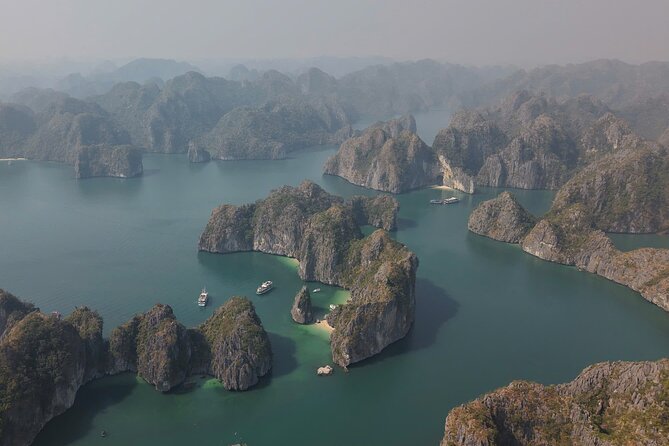 Ha Long Bay Cruise Day Tour - Cave, Kayaking, Swimming & Lunch - Onboard schedule and the sunset party: snacks, not a feast