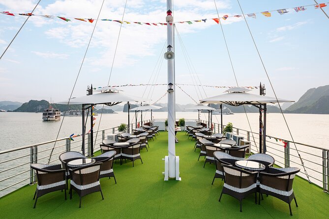 Ha Long Bay Luxury Cruise from Hanoi with Jacuzzi & Local Lunch - Titop Island: beach time and a halfway climb