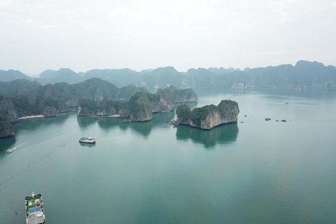 Ha Long Bay Six Hours Trip Kayaking & Swimming on Beach - Kayaking in Luon Cave or a Bamboo Boat: The Active Core