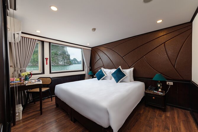 Halong Bay 2-Day Deluxe Cruise Tour including Kayaking and Cooking Demonstration - Halong Bay overnight comfort: cabin, meals, and the pace you get