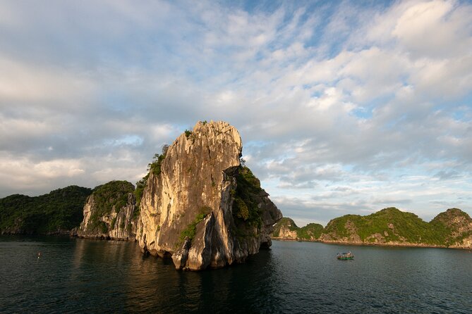 Halong Bay 2 Days 1 Night Traditional Boat - Day 1: Ti Top Island stairs, beach time, and panoramic payoff