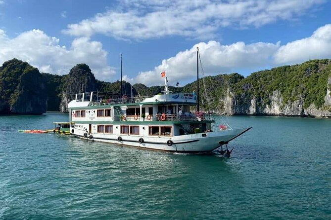 Halong Bay 2 days on classic cruise, small group, biking-kayaking - Day 1 in motion: Cai Beo to caves, then sunset deck time