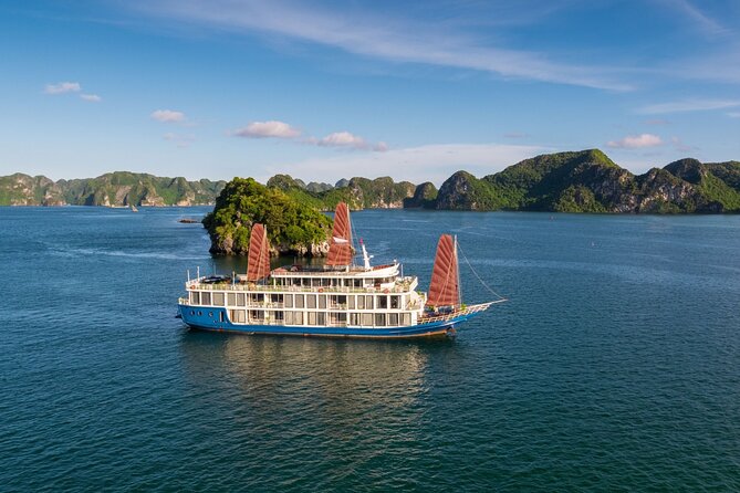 Halong Bay 2D1N Cruise Tour, Full Meals, Caves, Kayak &Transfer - Lotus Cruise Ship: Private Balcony, Sundeck Time, and Shared Comfort