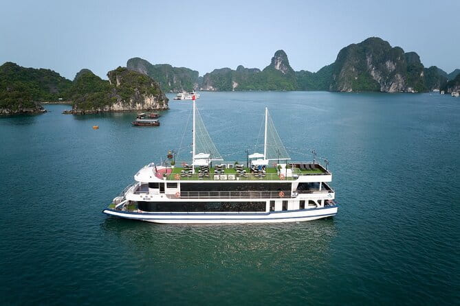 Halong bay 4 hours boat tour from Halong city with 2 caves, kayak - Hon Dinh Huong and Hon Ga Choi: short stops that still help you make sense of the bay